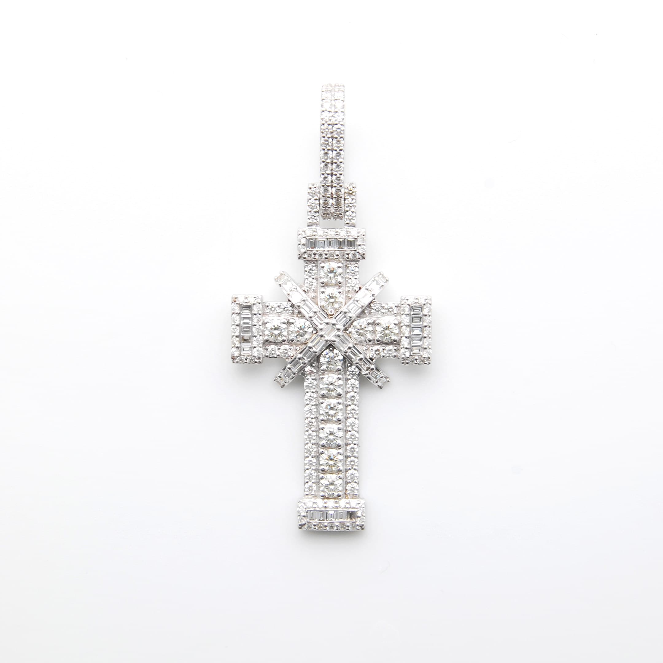 Round and baguette diamond cross pendant
