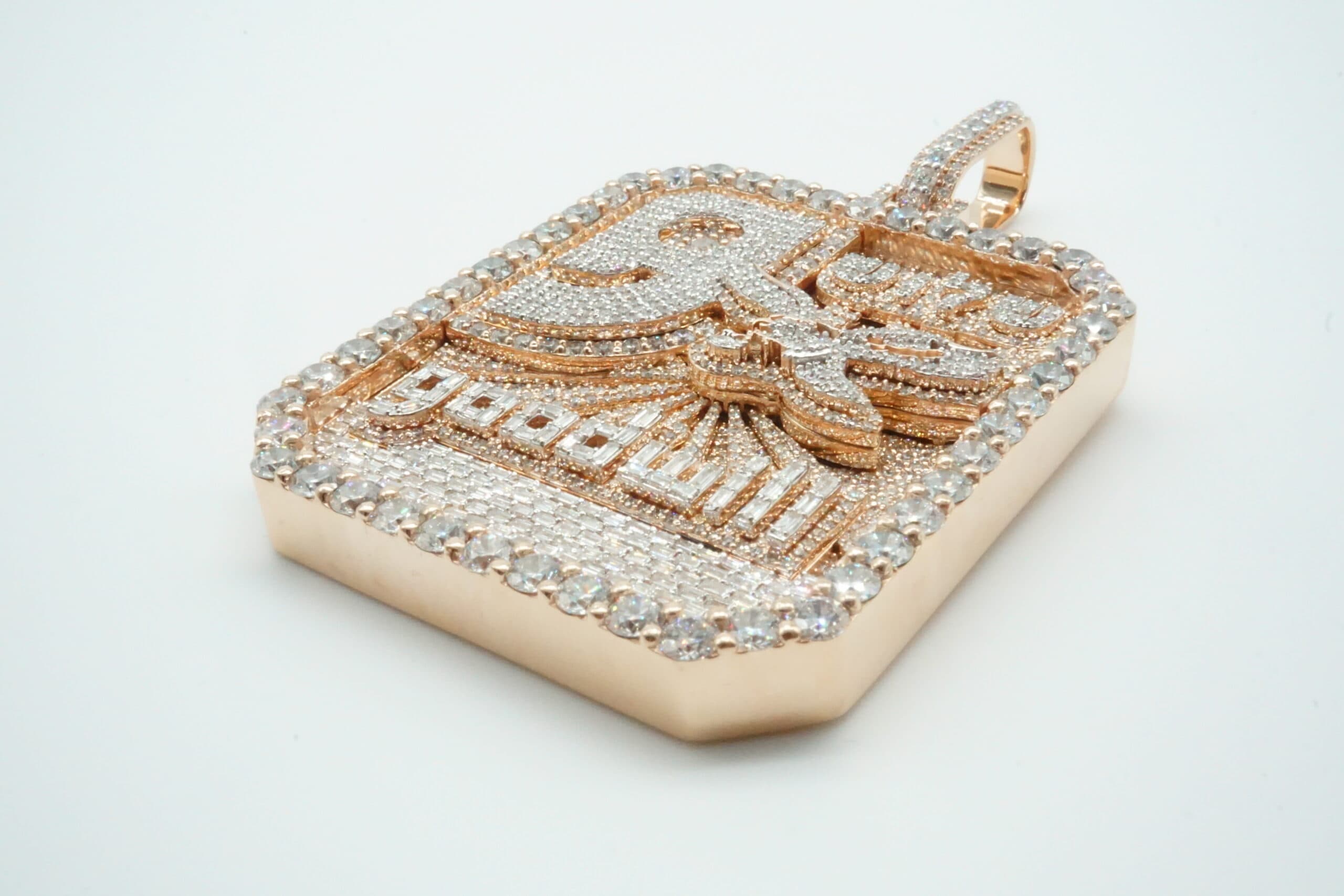 Rose gold eagle name tag pendant with baguette diamonds