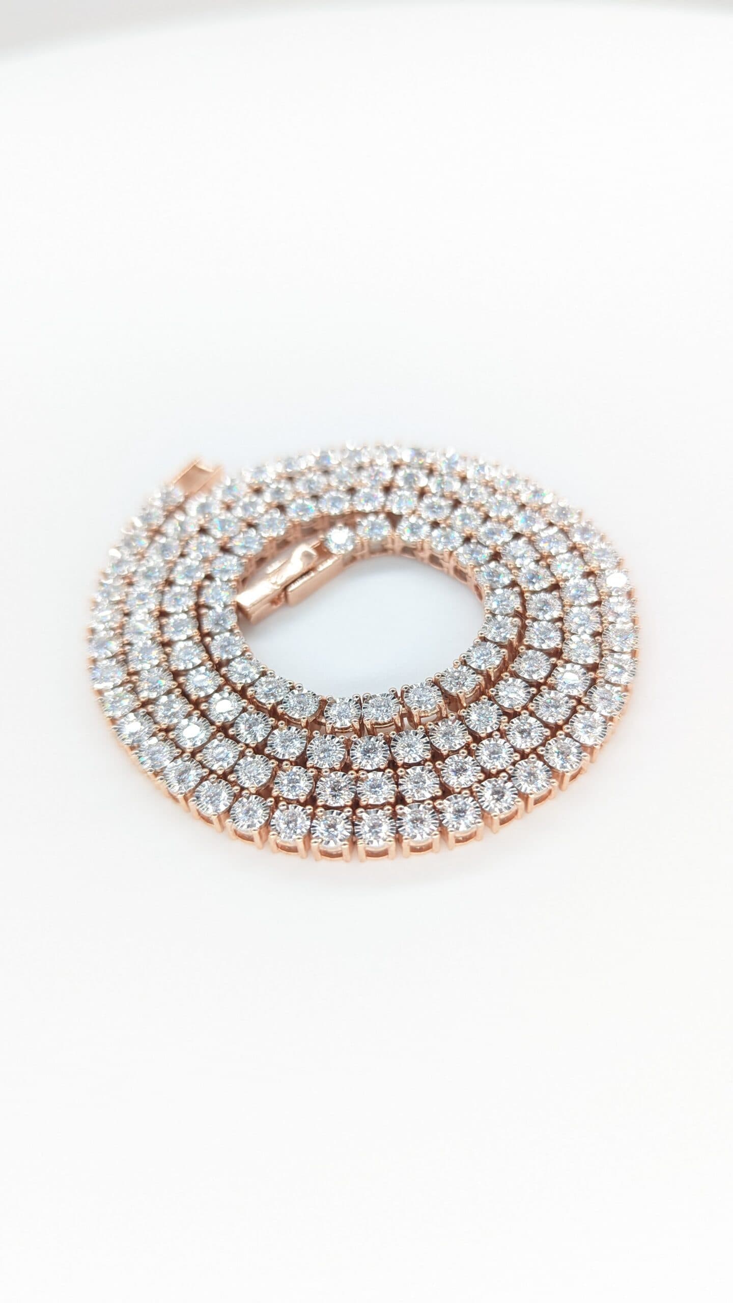 Rose gold four-prong diamond tennis chain