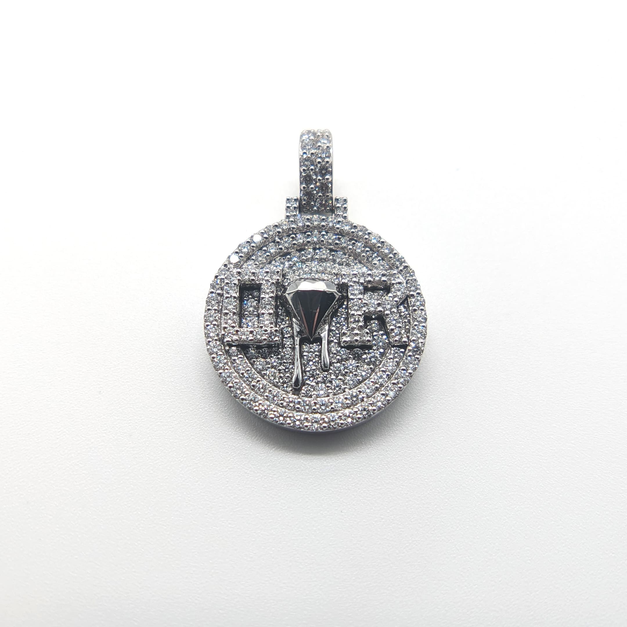White gold DR medallion with a dripping diamond motif