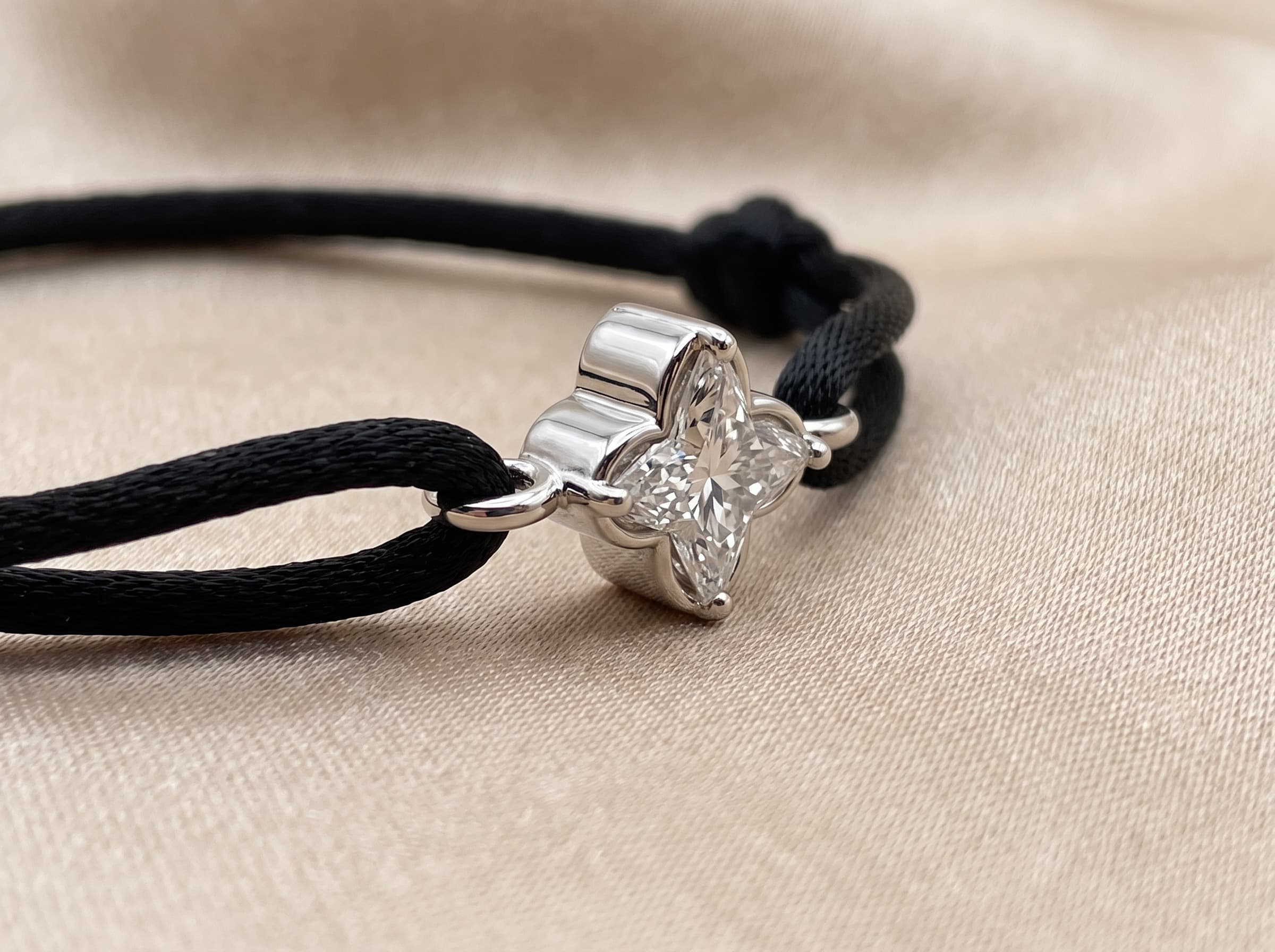 The CLRTY Bracelet, a four-point diamond setting on a hand-knotted cord